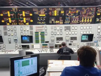 Persons Sitting in SCADA control room